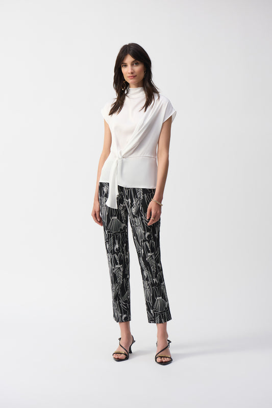 CONVERSATIONAL PRINT CROP PANTS